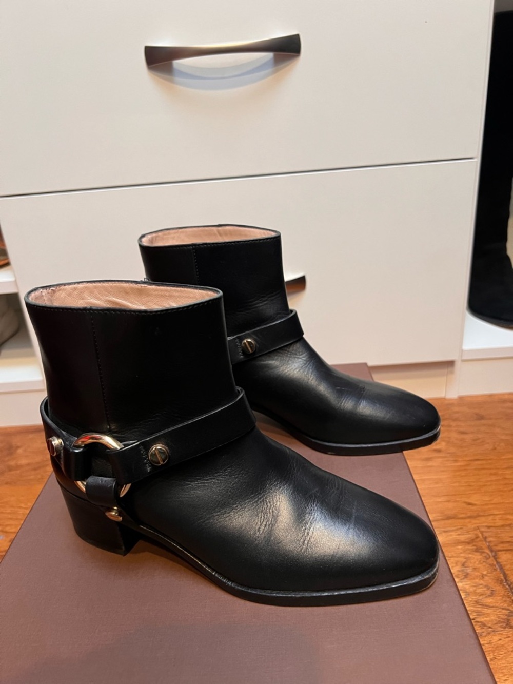 Classic Black Leather Ankle Boot with Metal Harness Detail